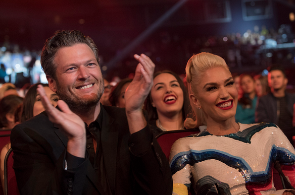 Gwen Stefani and Blake Shelton at an awards show.