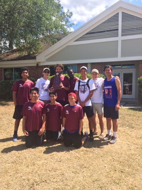 The boys tennis team after winning Districts.