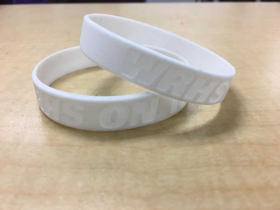 Bulls on Track wrist band that were given out during the first quarter to students who were on track.