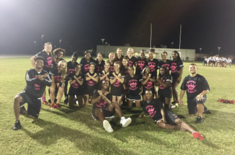 Senior powderpuff team and coaches after their win against SunLake
