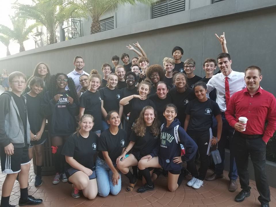 Band director Patrick Duncan and staff member Justin Baggett with some of the band members