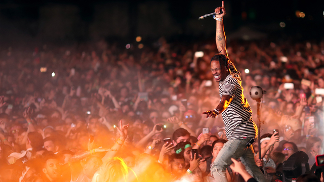 Travis Scott performing at a previous concert before the Tampa location concert was cancelled.