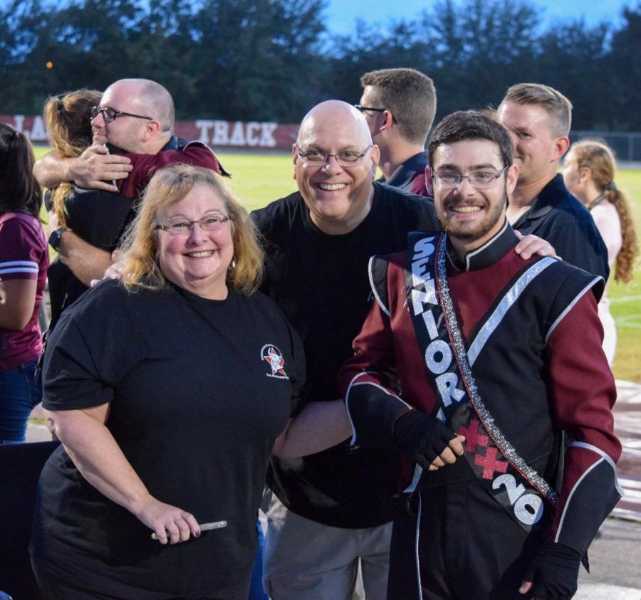 Blitzer and his parents on senior night 