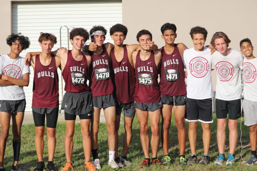 Varsity boys team taking their final team picture.