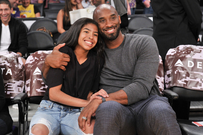 Kobe and daughter Gianna at a basketball game together.