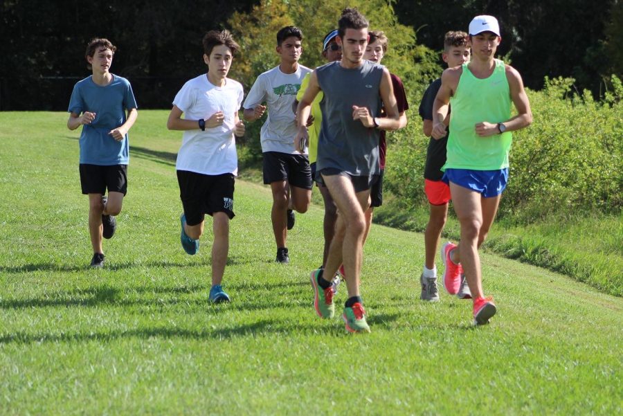 Boys cross country team running as they prepare for districts. 