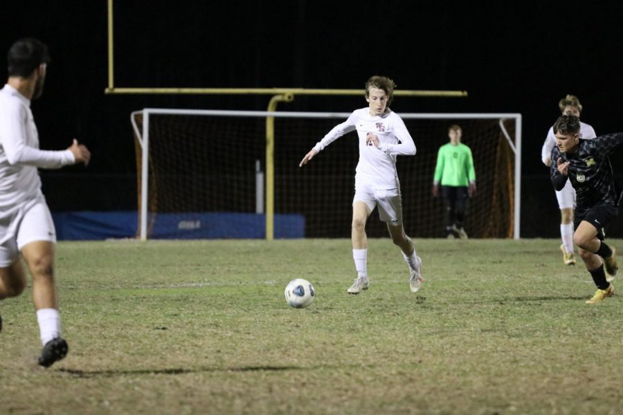 Colin Bailey (2), getting the ball up the field to teammates. 