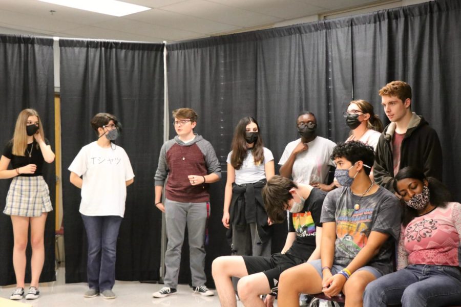 Actors rehearsing their lines and blocking for the play on October 8 and 9.