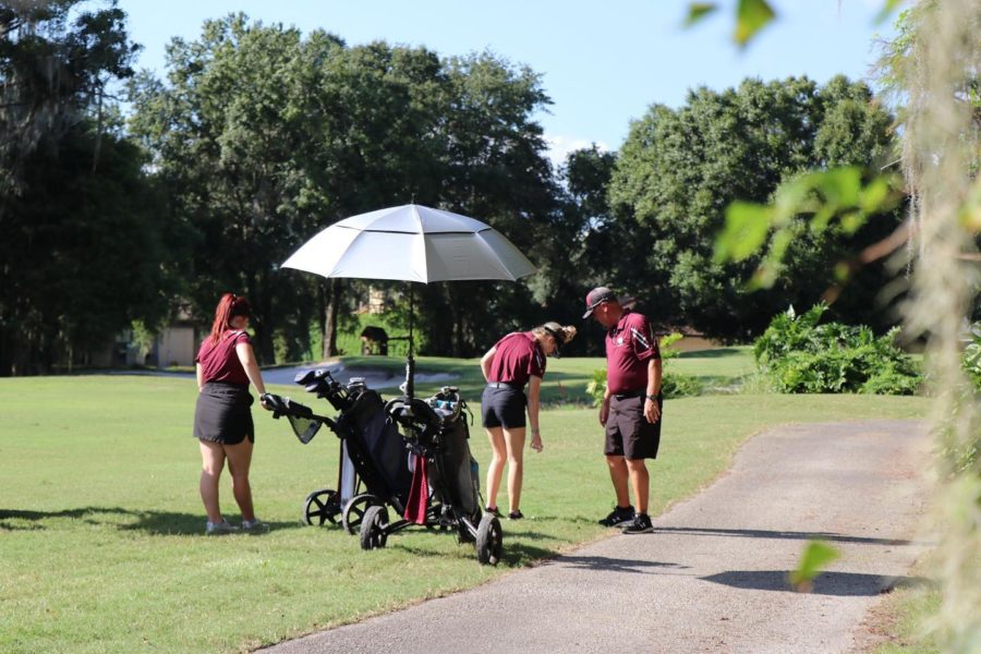 Girls Golf team prepares for Districts by working hard at every practice.