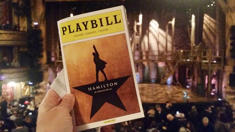 A picture of the Hamilton playbill and stage at the Richard Rogers Theatre in New York City.
