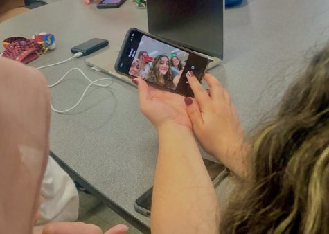 Female students taking a selfie for BeReal.