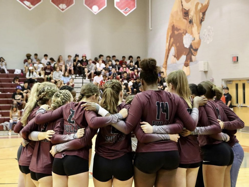 Wiregrass varsity in a team huddle during the River Ridge game.