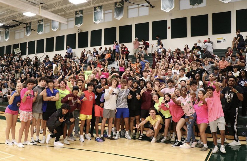 The+Wiregrass+student+section+glowed+out+for+the+Cypress+Creek+volleyball+game.