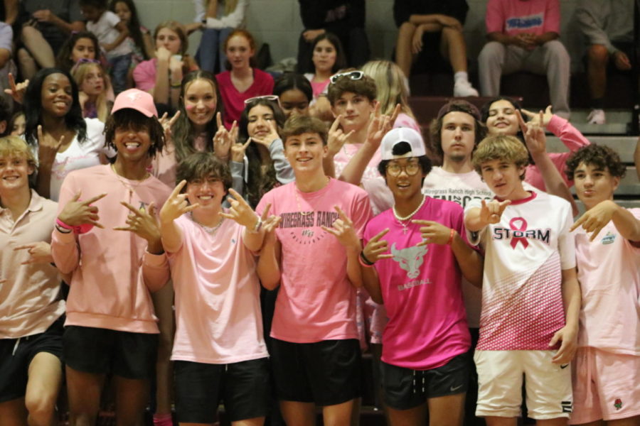 Fans cheering on Wiregrass Ranch Varsity Volleyball