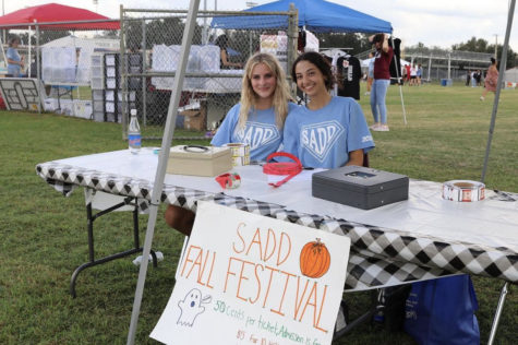 SADD club members running the Fall festival ticket booth.