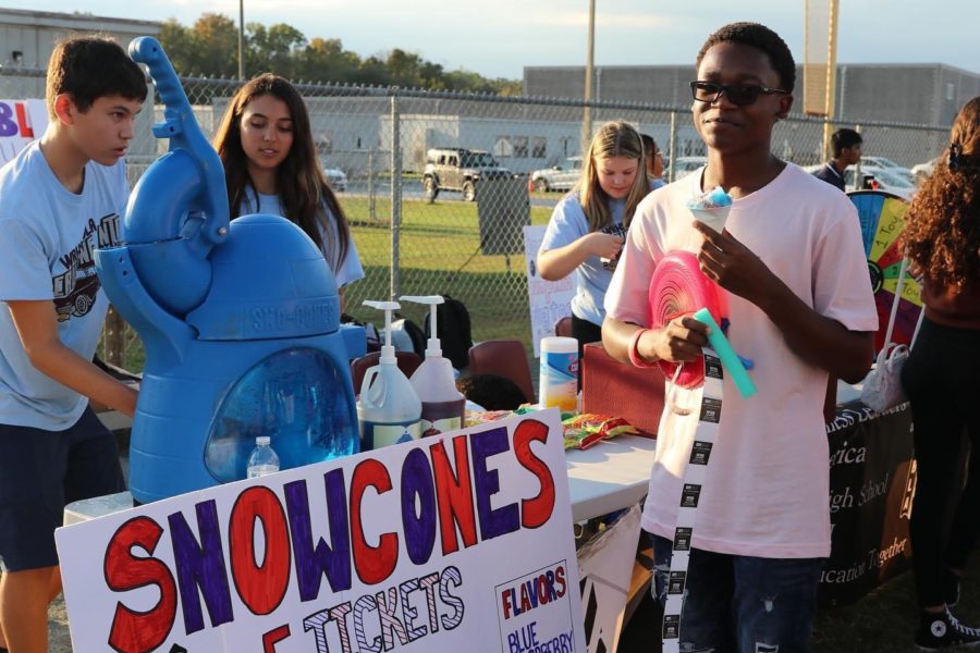 FBLA members pass out snocones at their fall festival booth.